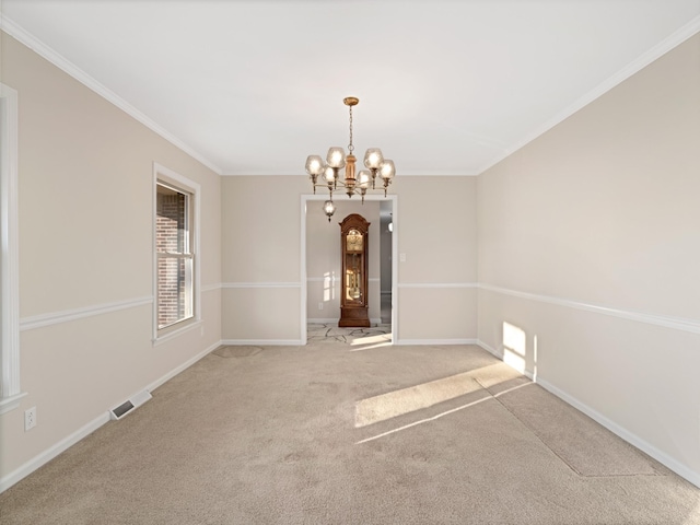 spare room with visible vents, ornamental molding, light carpet, a chandelier, and baseboards