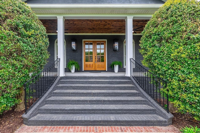 entrance to property with french doors and brick siding