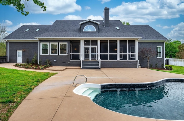 rear view of property featuring a fenced in pool, brick siding, a patio, a chimney, and a sunroom