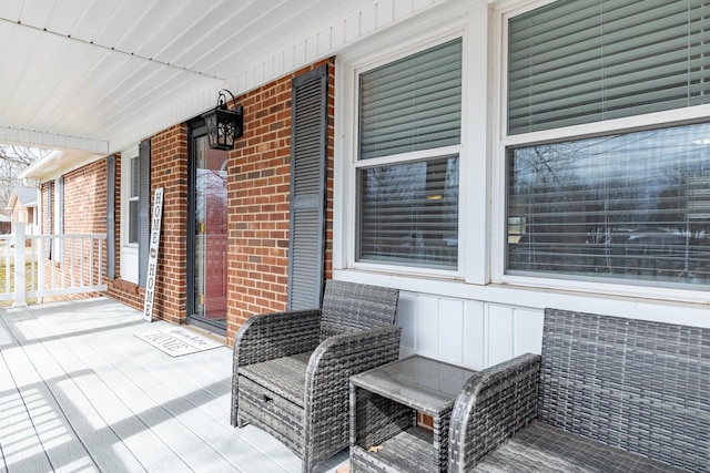 deck with covered porch