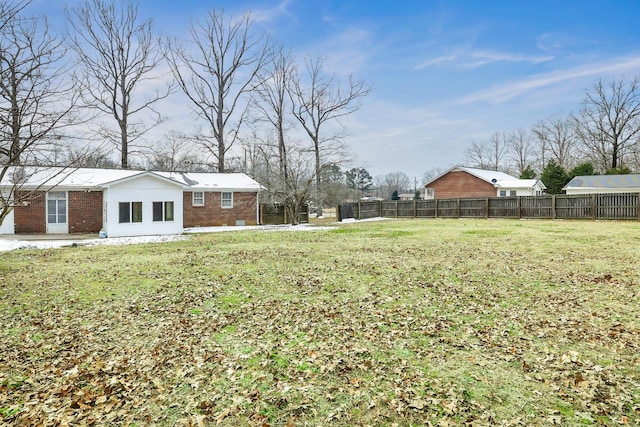 view of yard featuring fence