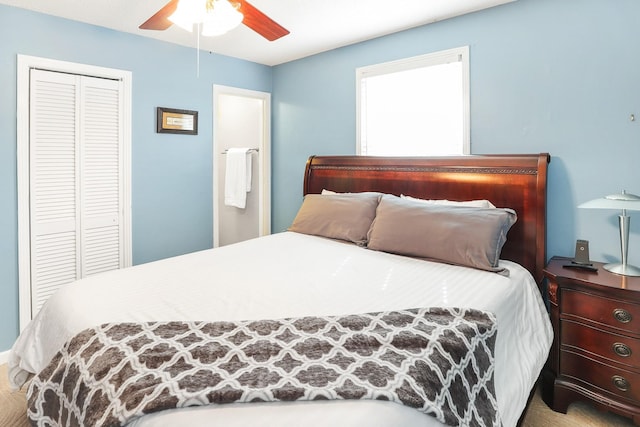 bedroom with a closet and a ceiling fan