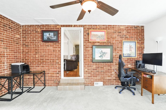 carpeted home office with visible vents