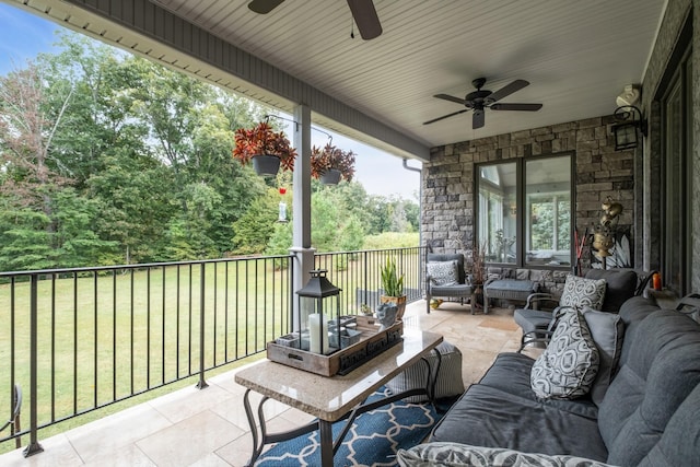 view of patio with an outdoor hangout area and a ceiling fan