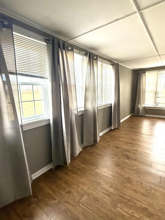 237 County Farm Rd, Ethridge, TN 38456 - empty room featuring plenty of natural light, dark wood finished floors, and baseboards