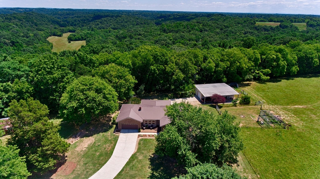 aerial view with a wooded view