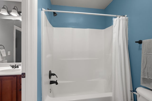 full bath featuring shower / bath combination with curtain, vanity, and toilet