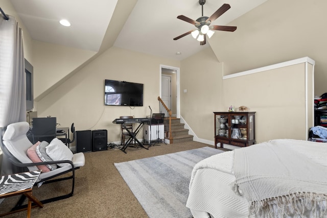 bedroom featuring lofted ceiling, carpet flooring, a ceiling fan, and baseboards