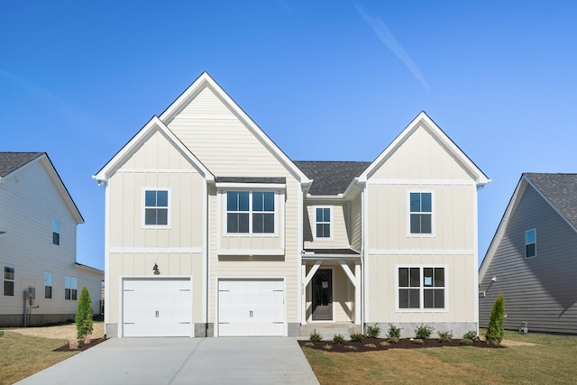 modern farmhouse style home with a shingled roof, an attached garage, board and batten siding, driveway, and a front lawn