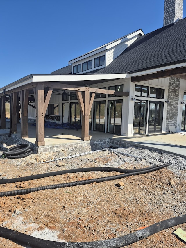 view of home's community with a patio area