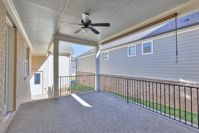 view of patio featuring ceiling fan