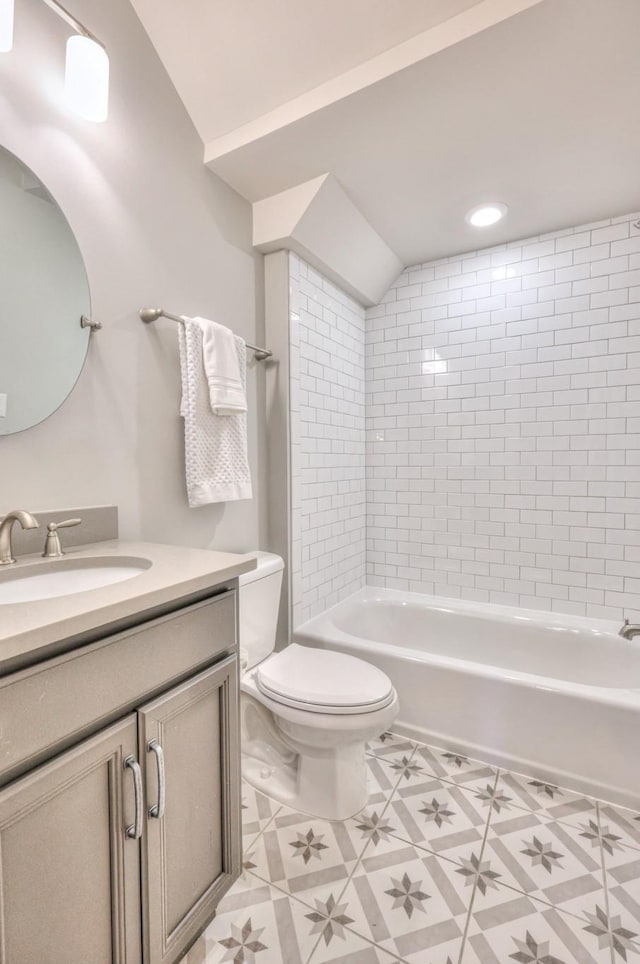 full bath with shower / washtub combination, vanity, toilet, and tile patterned floors