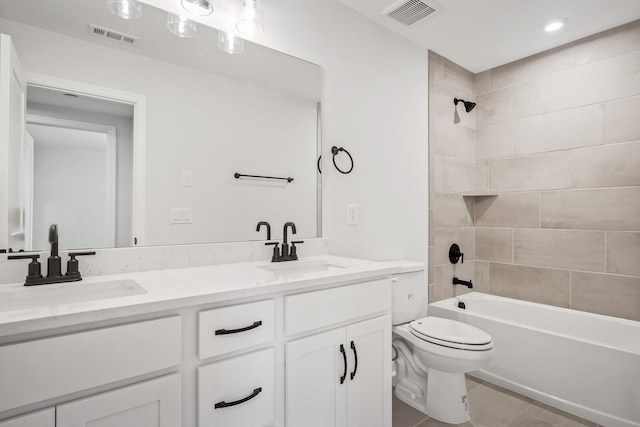 full bathroom featuring visible vents, a sink, and double vanity