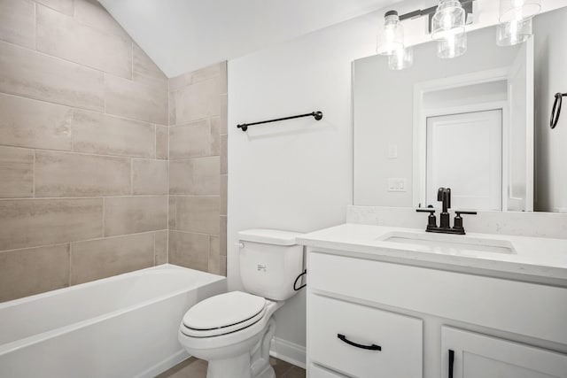 full bath with lofted ceiling, toilet,  shower combination, and vanity