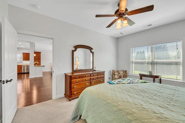 bedroom featuring baseboards, recessed lighting, visible vents, ceiling fan, and light colored carpet