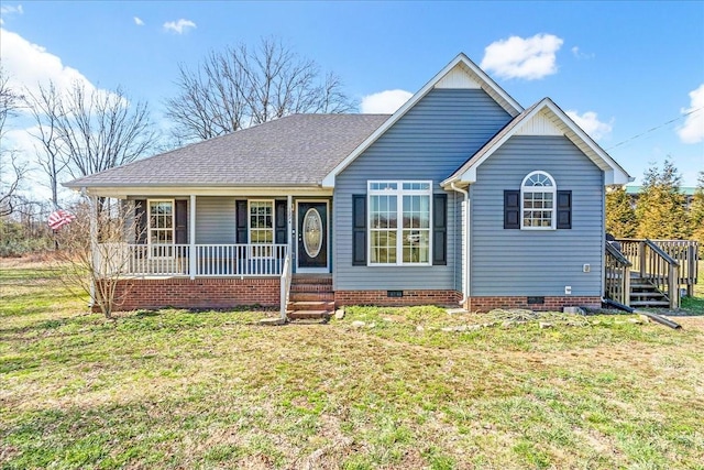 ranch-style home featuring crawl space, covered porch, roof with shingles, and a front yard