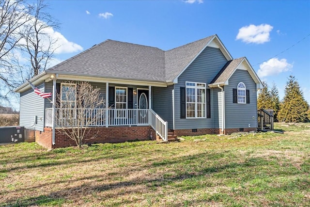 view of front of home with crawl space, covered porch, a shingled roof, and a front lawn