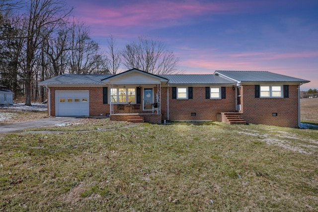 single story home with crawl space, a garage, and brick siding