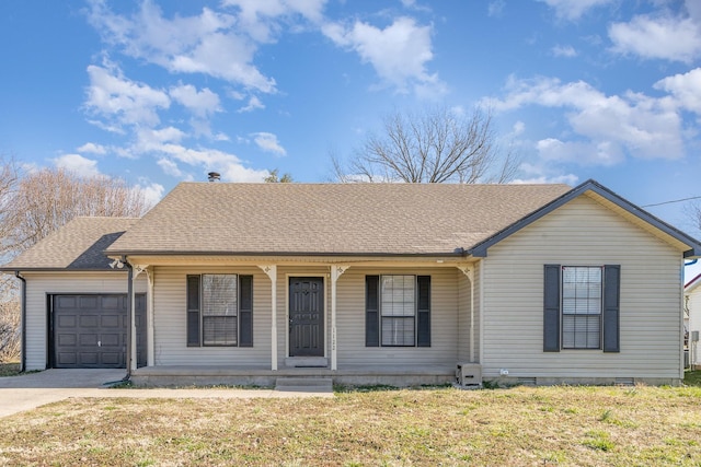 view of front of house with a shingled roof, concrete driveway, an attached garage, crawl space, and a front lawn