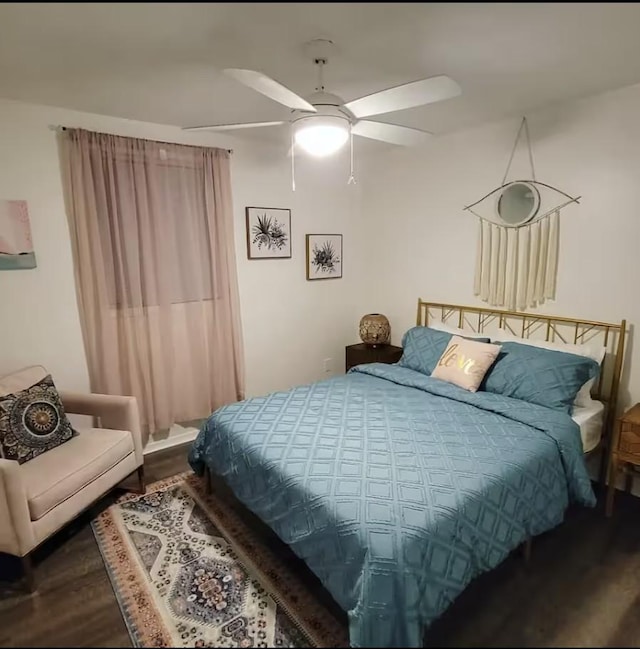 bedroom featuring a ceiling fan and wood finished floors