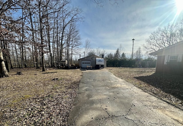 view of road featuring driveway