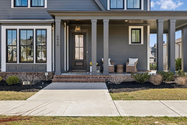 property entrance with a porch