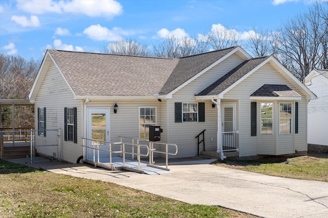 view of front of house featuring a shingled roof