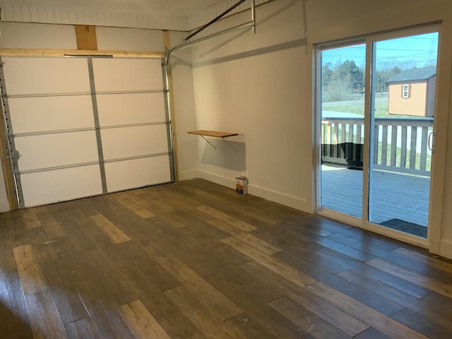 garage featuring baseboards