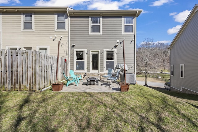 rear view of house featuring central air condition unit, a lawn, fence, and a patio