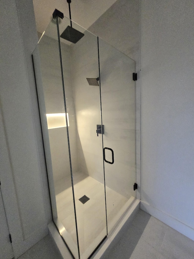 full bathroom with a shower stall