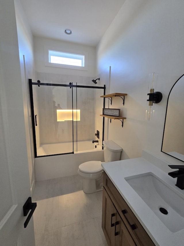 full bathroom with toilet, shower / bath combination with glass door, and vanity