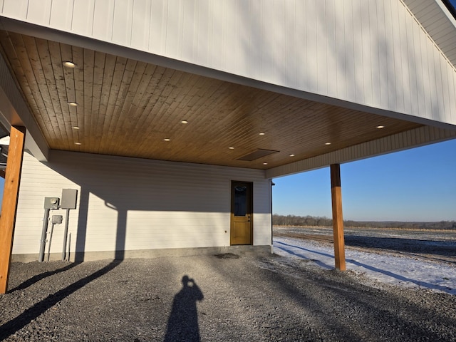 exterior space with a carport