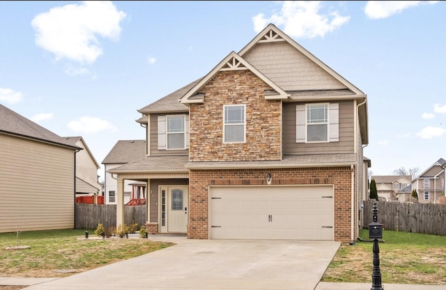 craftsman house with an attached garage, brick siding, fence, driveway, and stone siding