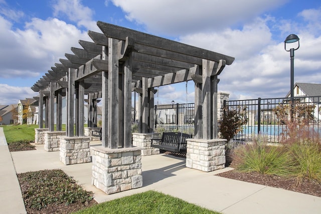 view of patio / terrace featuring fence and a pergola