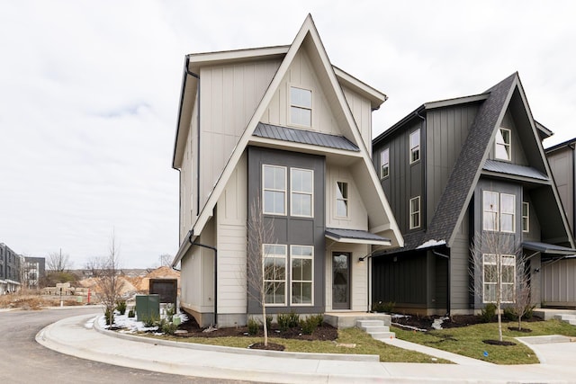 view of front of house featuring metal roof and board and batten siding