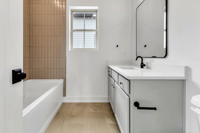 full bathroom featuring bathing tub / shower combination, baseboards, and vanity