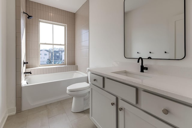 bathroom featuring toilet, tile patterned floors,  shower combination, and vanity