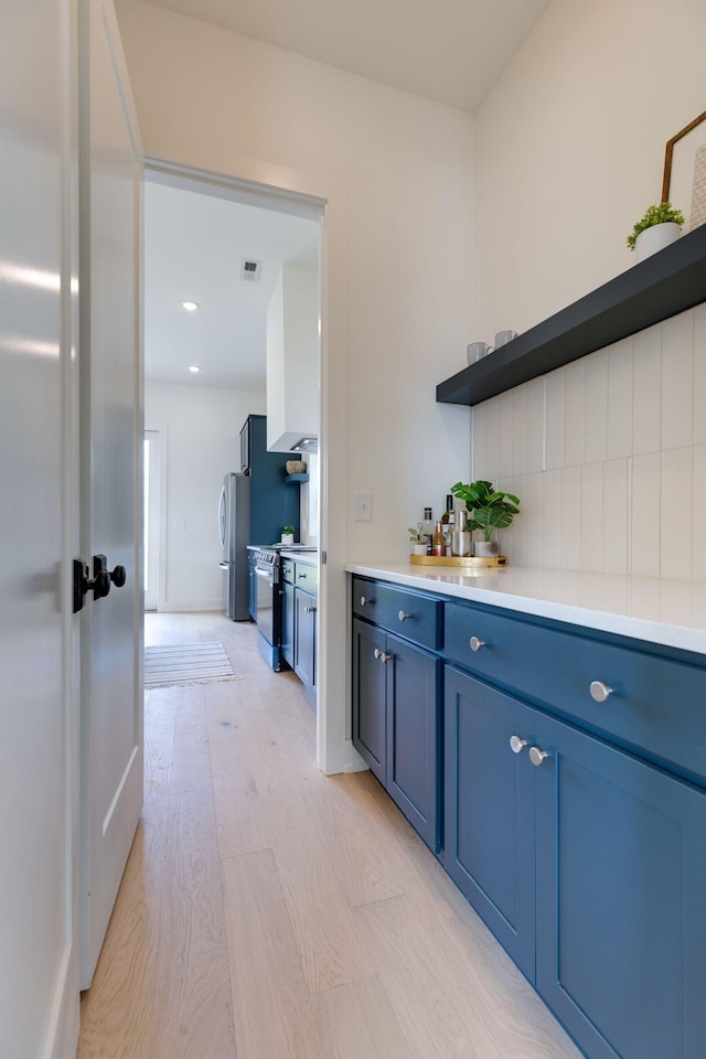 406 Morningside Mnr, Nashville, TN 37209 - bar featuring stainless steel appliances, light wood-style flooring, and recessed lighting