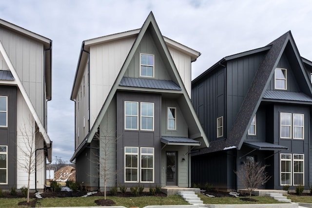 view of front of property featuring metal roof and board and batten siding