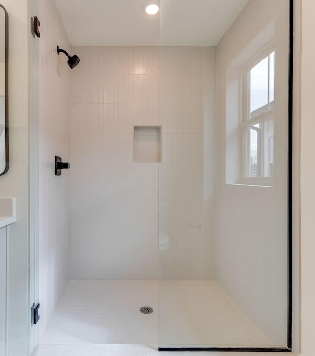 full bathroom with a stall shower