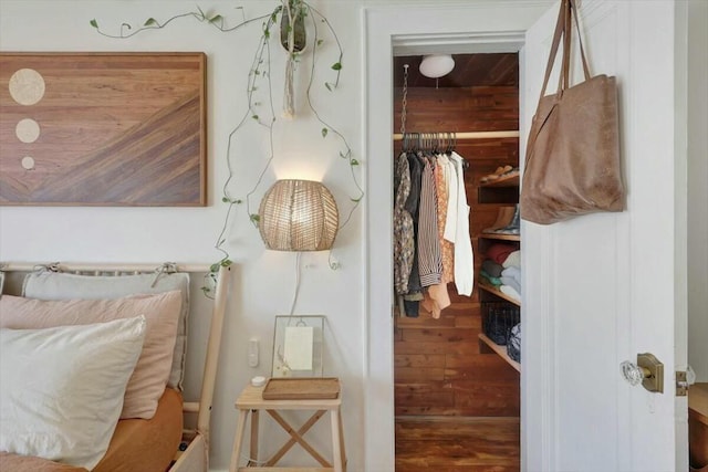 bedroom with a closet and wood finished floors