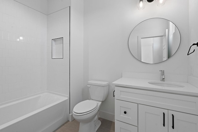 bathroom with washtub / shower combination, baseboards, toilet, and vanity