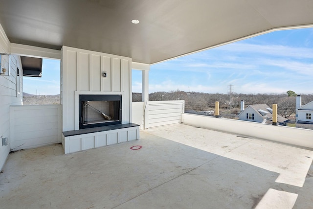 view of patio featuring exterior fireplace