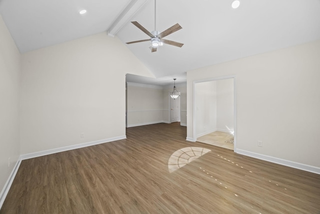 unfurnished living room featuring ceiling fan, wood finished floors, beam ceiling, and baseboards