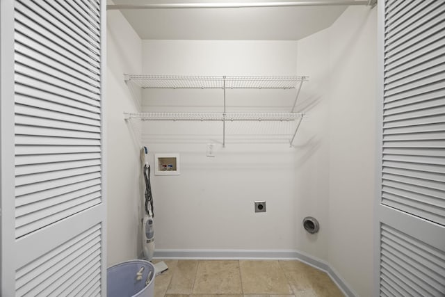 washroom featuring hookup for a washing machine, laundry area, electric dryer hookup, and baseboards