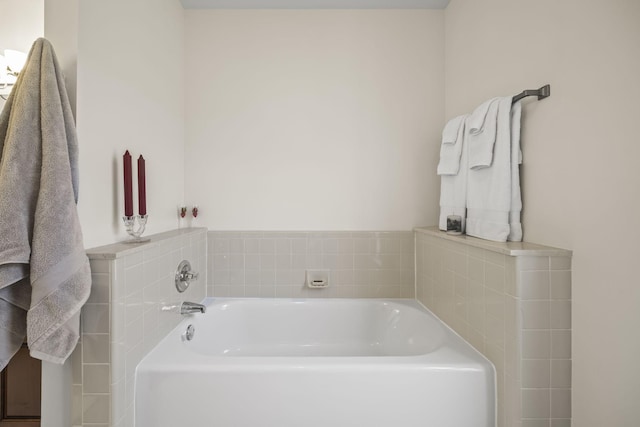 bathroom with a garden tub