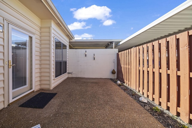 view of patio with fence