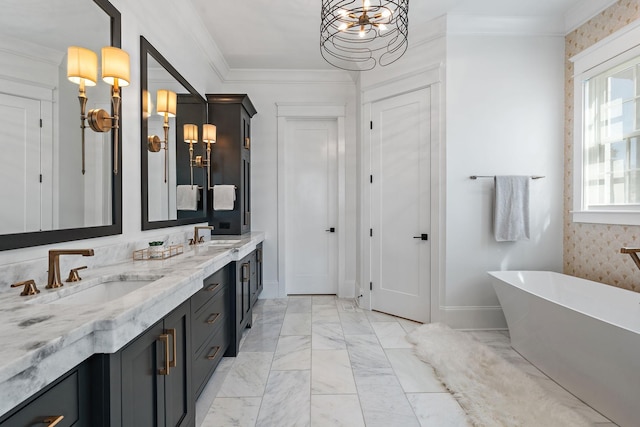 full bath featuring double vanity, marble finish floor, ornamental molding, and a sink