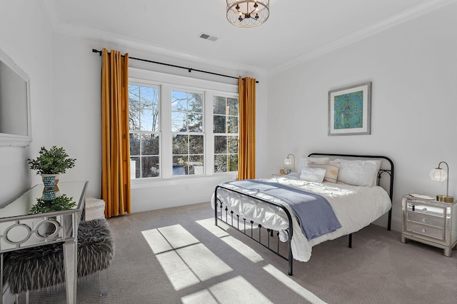 bedroom featuring ornamental molding, light colored carpet, and visible vents