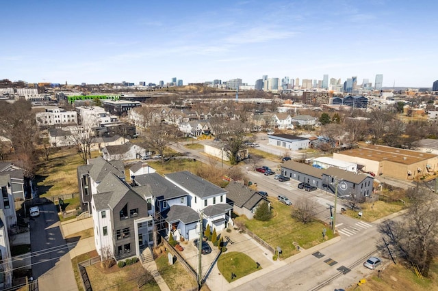 birds eye view of property with a view of city